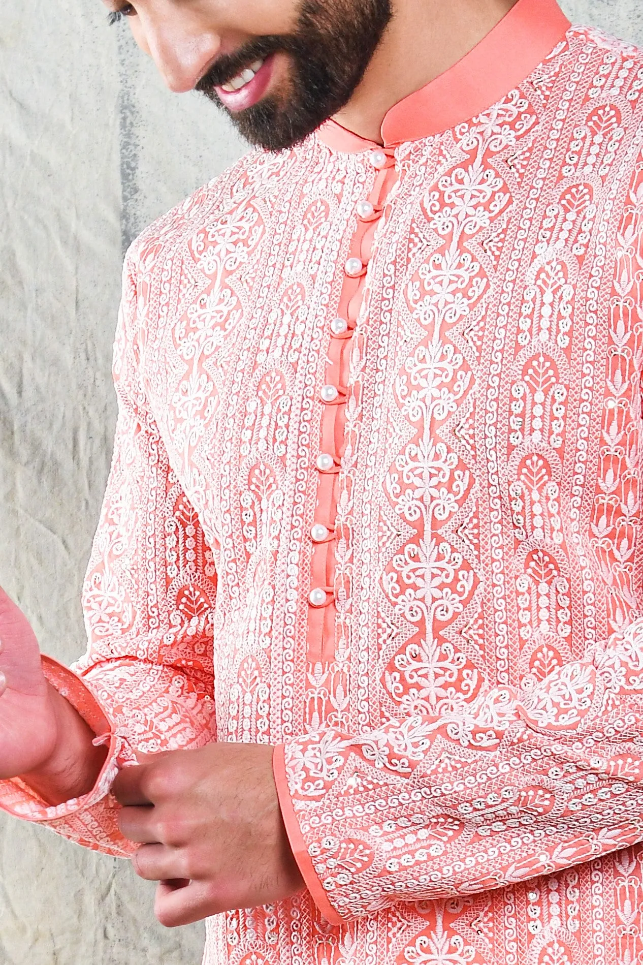 CORAL PINK SEQUINS EMBROIDERED CHIKANKARI KURTA PAJAMA SET WITH PEARL BUTTON DETAIL