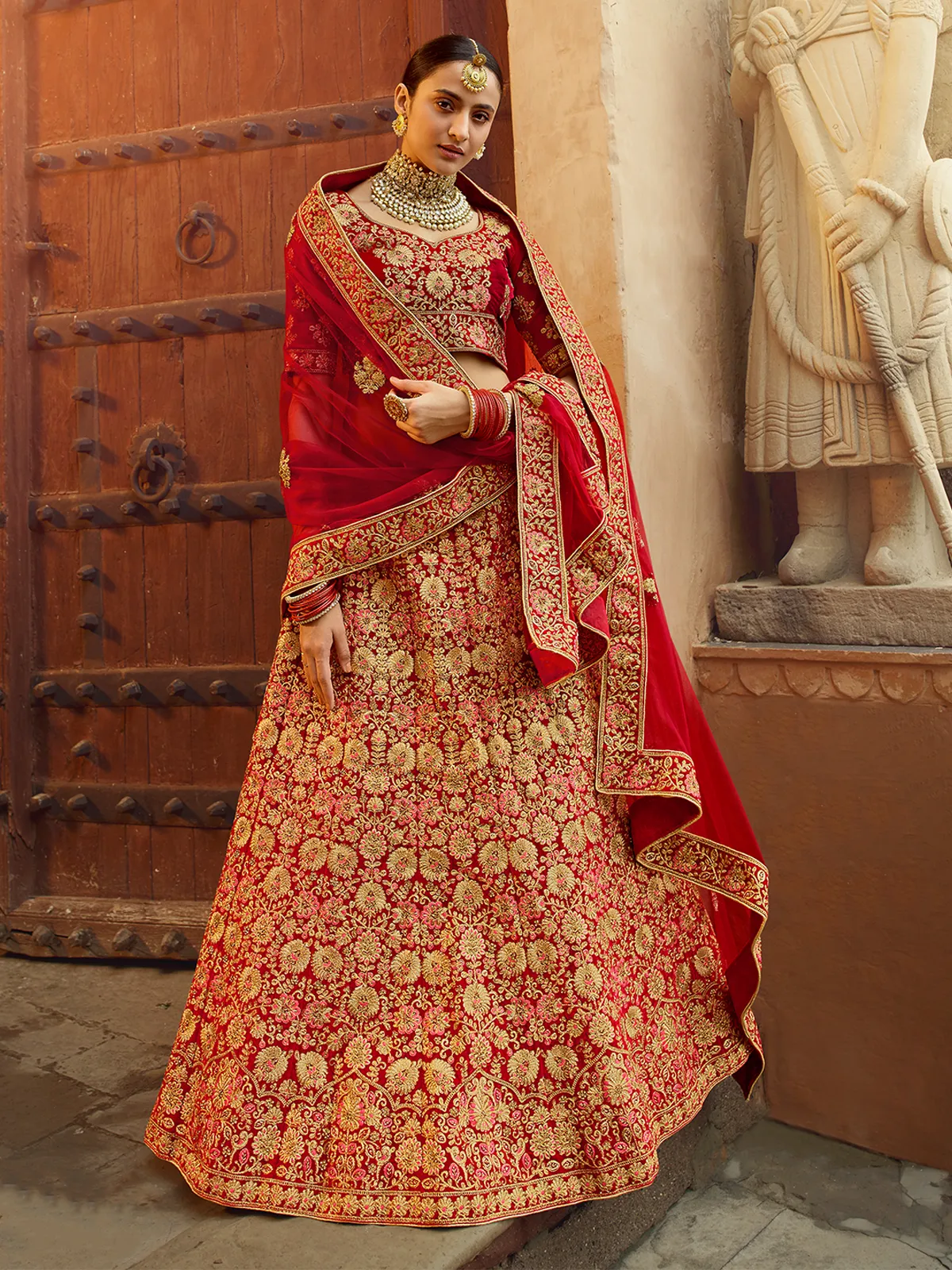 Red Embroidered Velvet Semi Stitched Lehenga With Unstitched Blouse